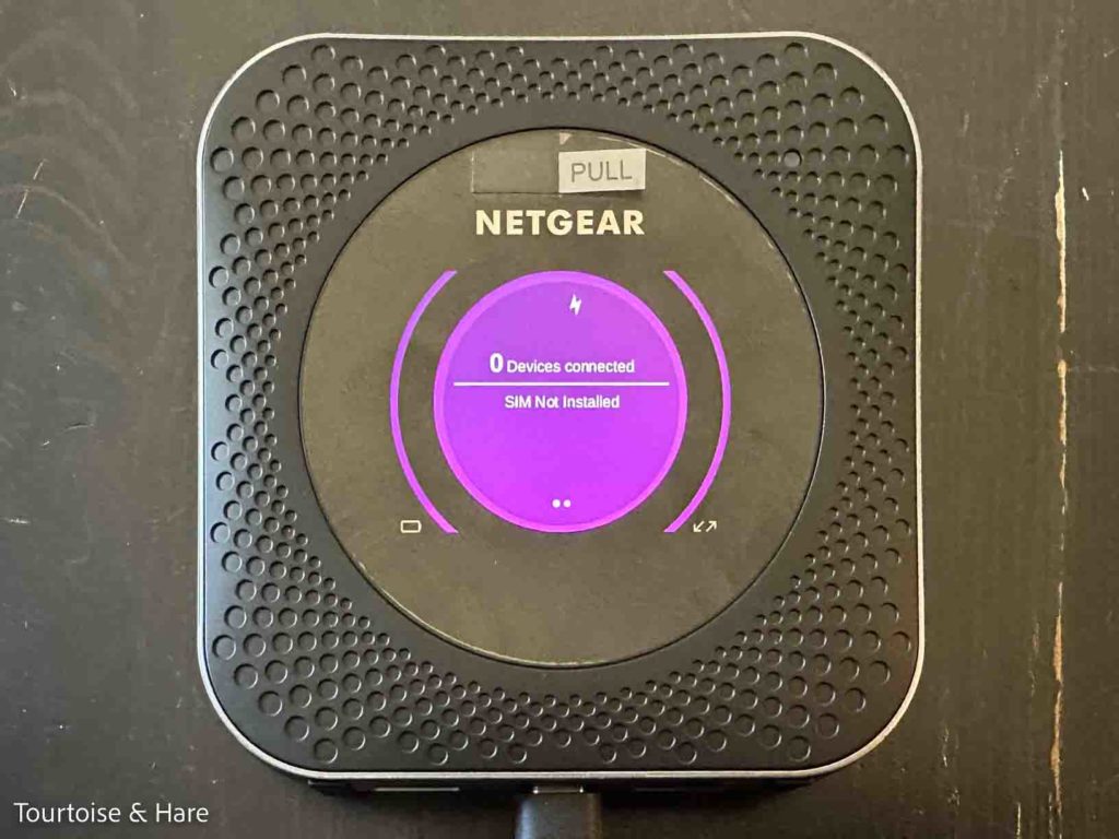 A Netgear Nighthawk M1. It's a black square with round screen area.